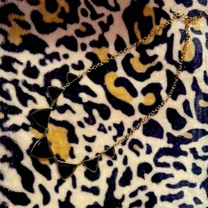 Sure gold necklace with black stones